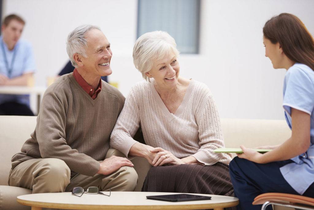 couple discussing brain aneurysm clipping vs coiling
