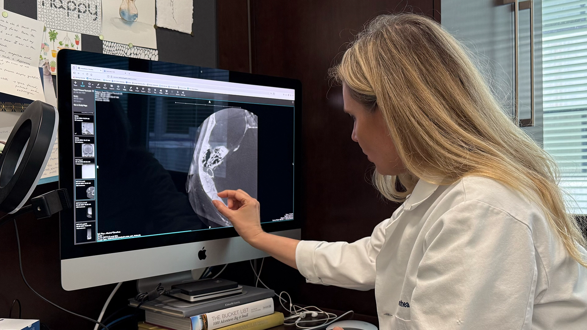 Dr. Dorothea Altschul, a pioneer in the condition of Pulsatile Tinnitus, reviews the scan of a patient presenting with the condition.