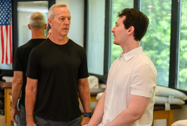 Man getting physical therapy after ACDF Surgery