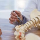 Doctor reviewing exercises after acdf surgery.