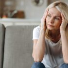 Woman stressing about her facial twitching.
