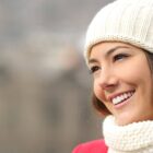 Candid girl with white teeth and smile in winter