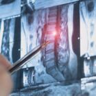 Doctor looking at MRI scan of a spine.